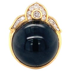 Anello con onice nera e diamanti in oro giallo 18 carati, anni '70 circa