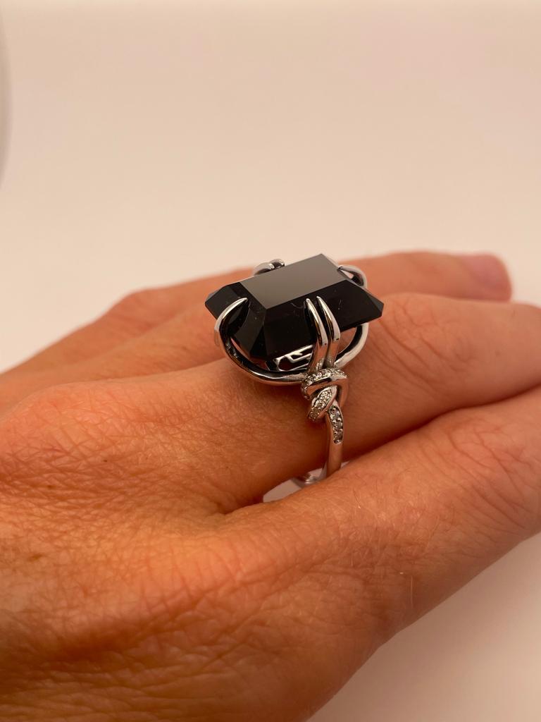 For Sale:  Black Onyx and Diamond Cocktail Forget Me Knot Unisex ring in 18ct white gold  14