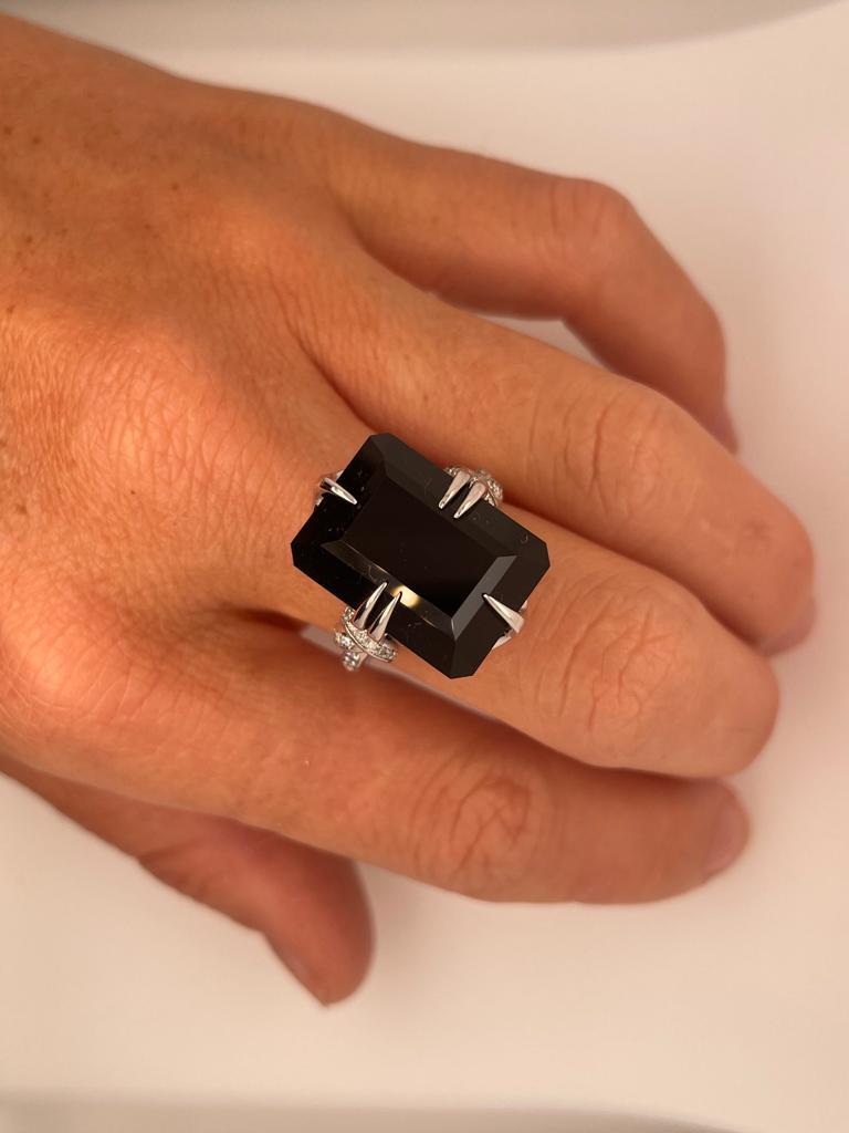 For Sale:  Black Onyx and Diamond Cocktail Forget Me Knot Unisex ring in 18ct white gold  9