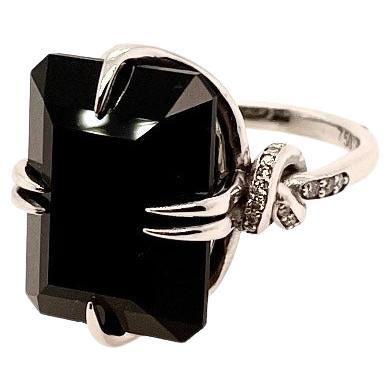 For Sale:  Black Onyx and Diamond Cocktail Forget Me Knot Unisex ring in 18ct white gold