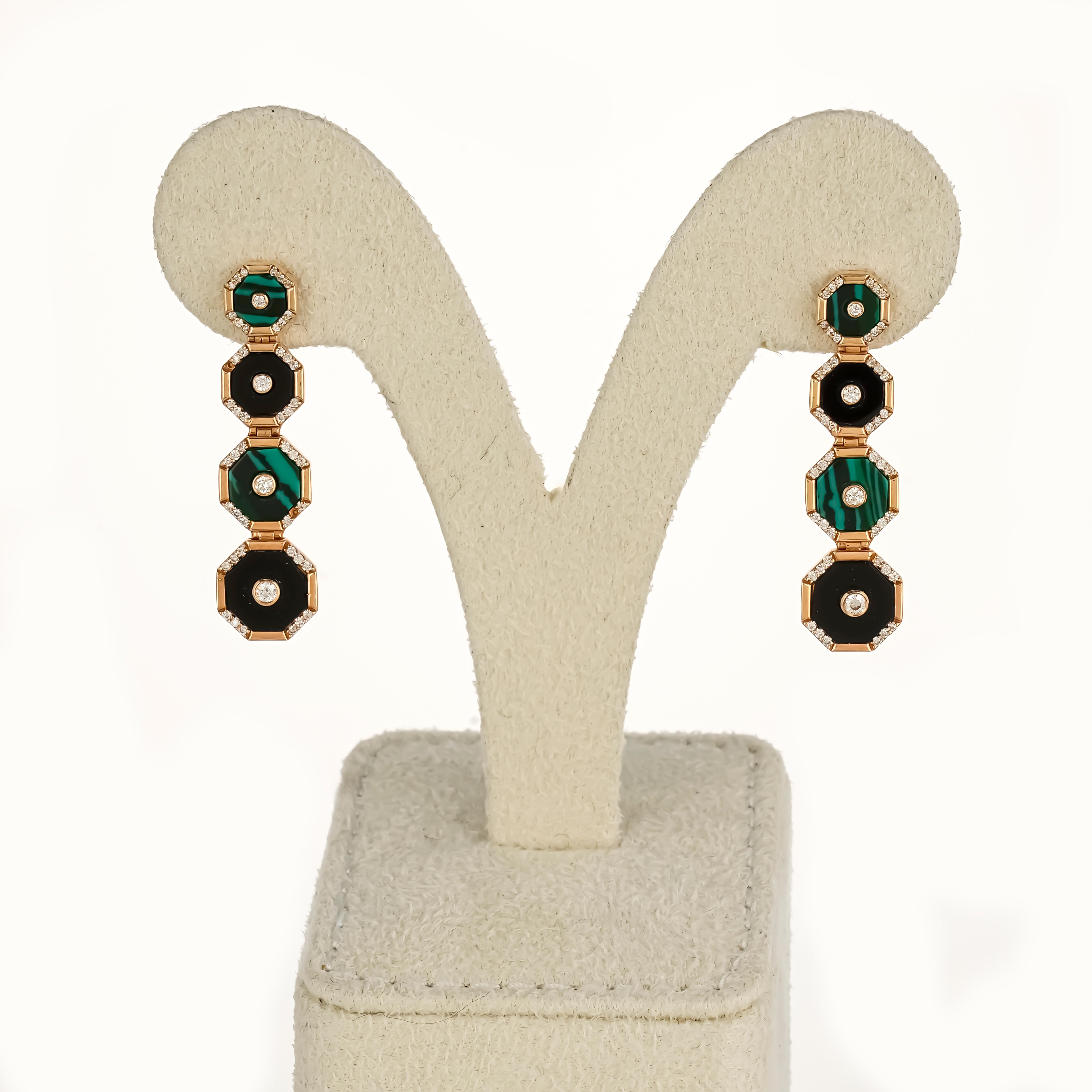 A pair superbly crafted dangle earrings, with 0.52 carat VS quality, F/G color diamonds and black onyx and malachite. The earrings come with a matching pendant as well. All set in solid 9.2 grams of 18K Rose Gold. The combination of the stones make