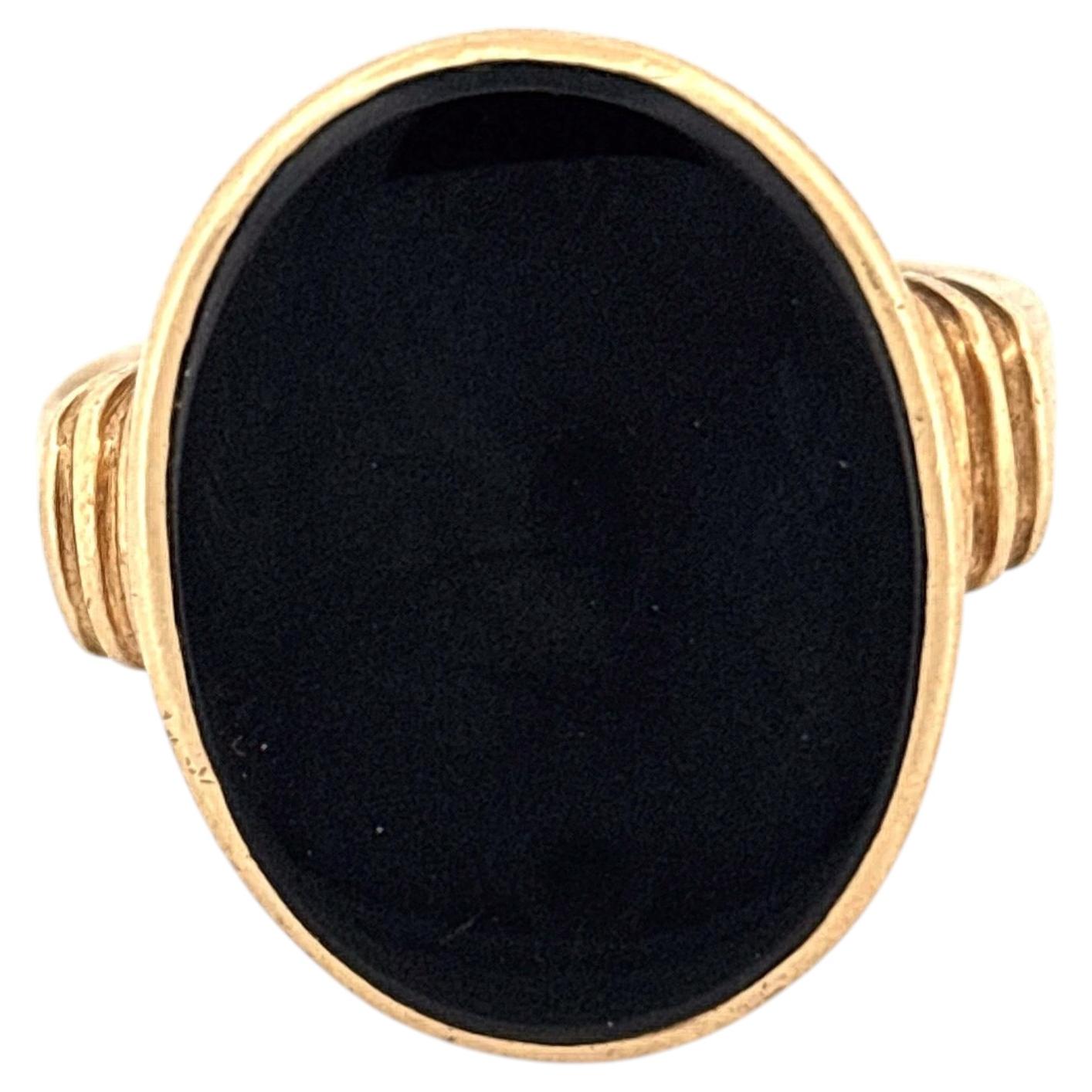 Antique 14k Yellow Gold Black Onyx Ring with Ribbed Shoulders