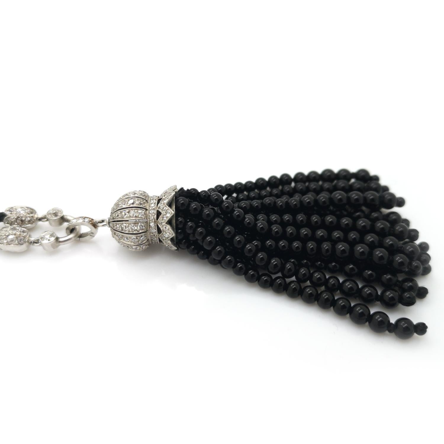Art Deco Black Onyx Bead and Diamond Tassel Pendant Necklace, Circa 1930 For Sale