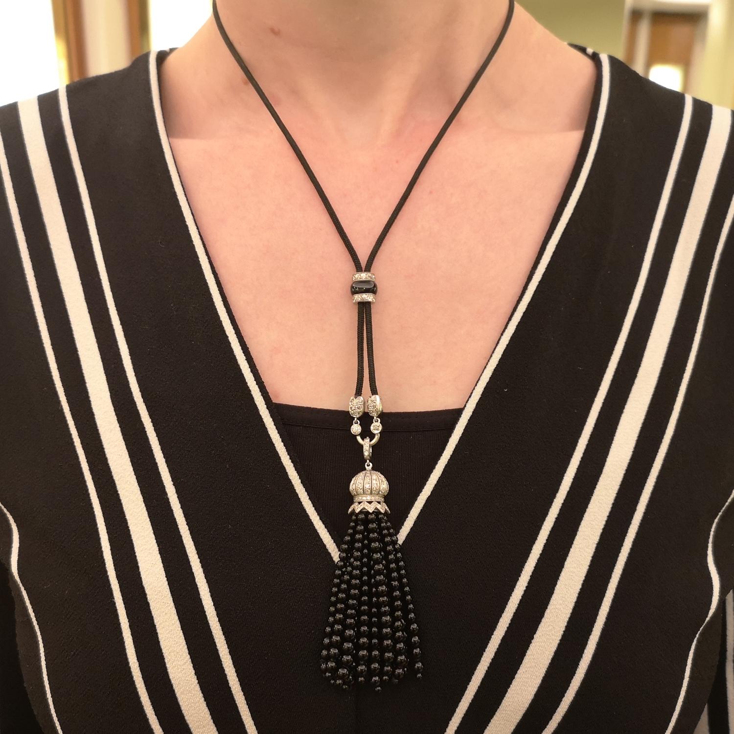Round Cut Black Onyx Bead and Diamond Tassel Pendant Necklace, Circa 1930 For Sale