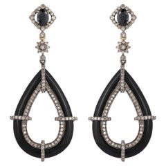 Boucles d'oreilles en onyx noir, saphir bleu et diamant