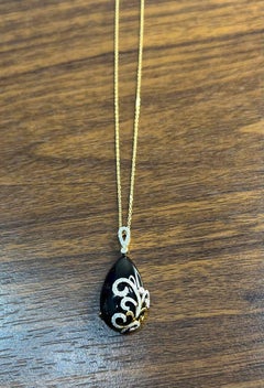 Black Onyx Cabochon Diamond 18 Karat Yellow Gold Floral Swirl Necklace Pendant