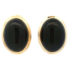 Boucles d'oreilles à levier en or jaune 14k avec cabochon d'onyx noir
