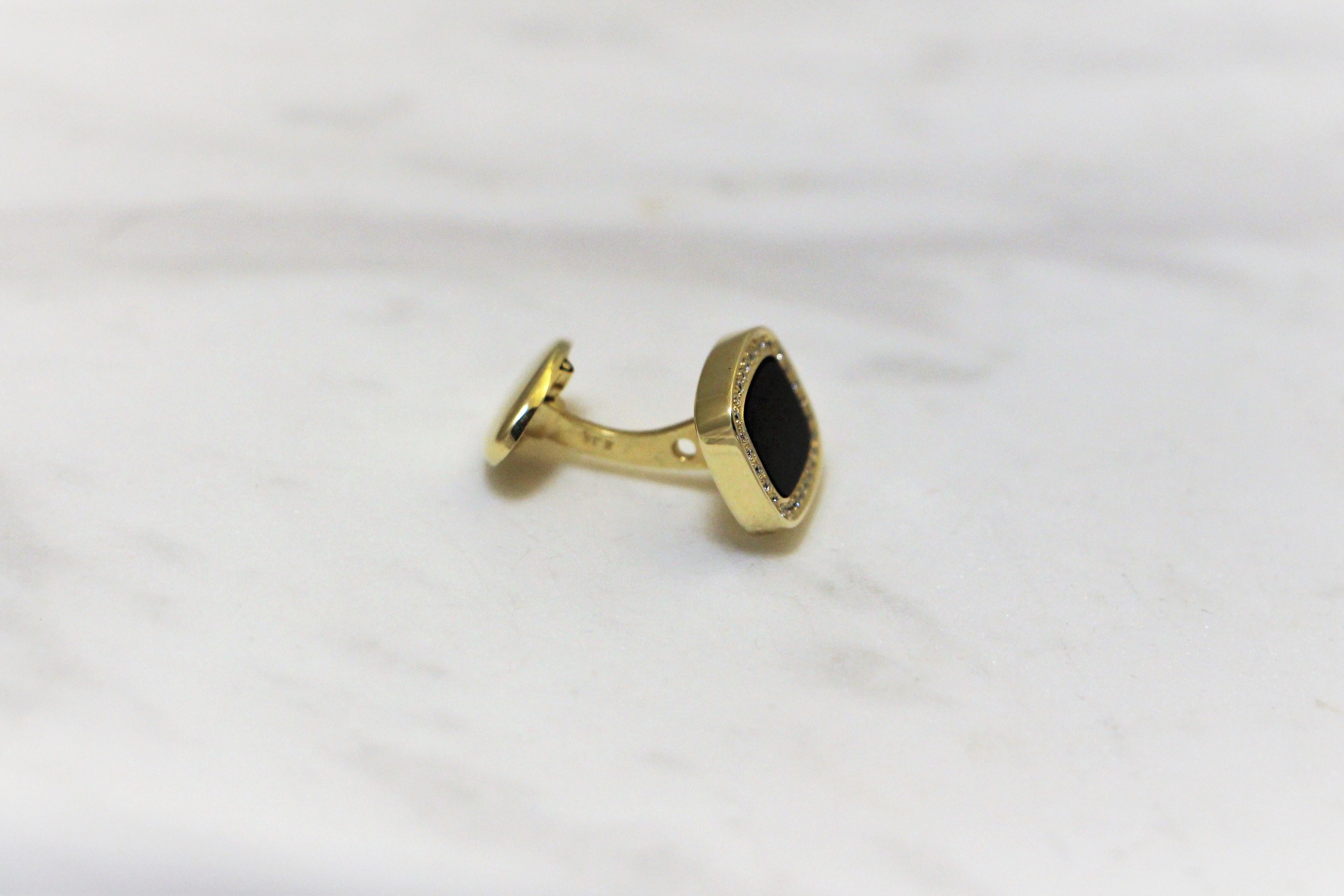 Unique Cufflinks handcrafted in 14Kt yellow gold, featuring hand carved black onyx and Pave brilliant cut diamonds 0.244 ct total. This unique combination captures the eternal spirit of fashion with timeless sophistication. The Black Onyx Cufflinks