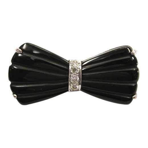 Black Onyx Diamond Bow Brooch Mounted in 9 Carat White Gold Dated circa 1930s