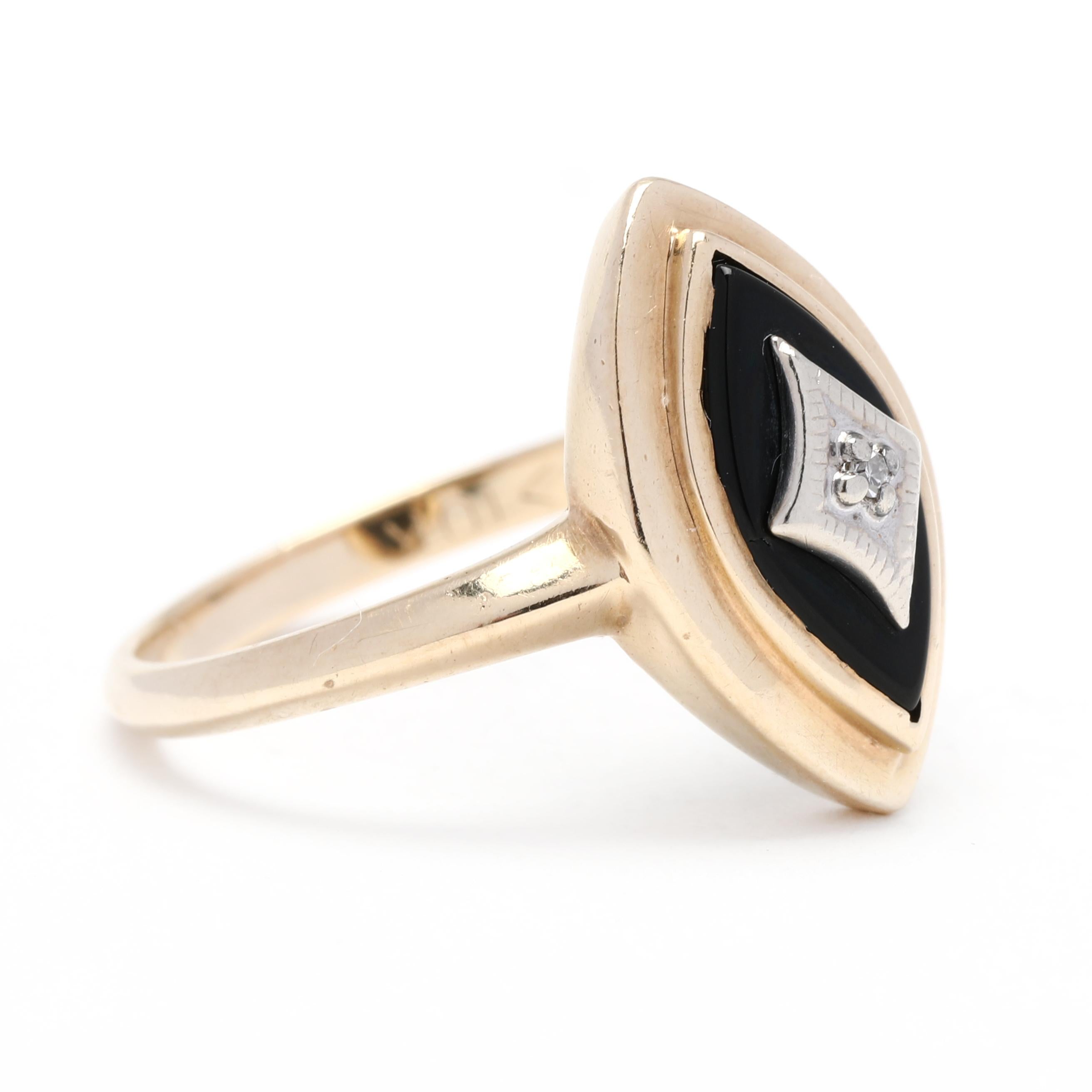 This beautiful black onyx diamond navette ring is crafted from 10K yellow gold and features a stunning marquise black onyx gemstone. The classic design of this simple black onyx ring makes it perfect for everyday wear and special occasions alike.