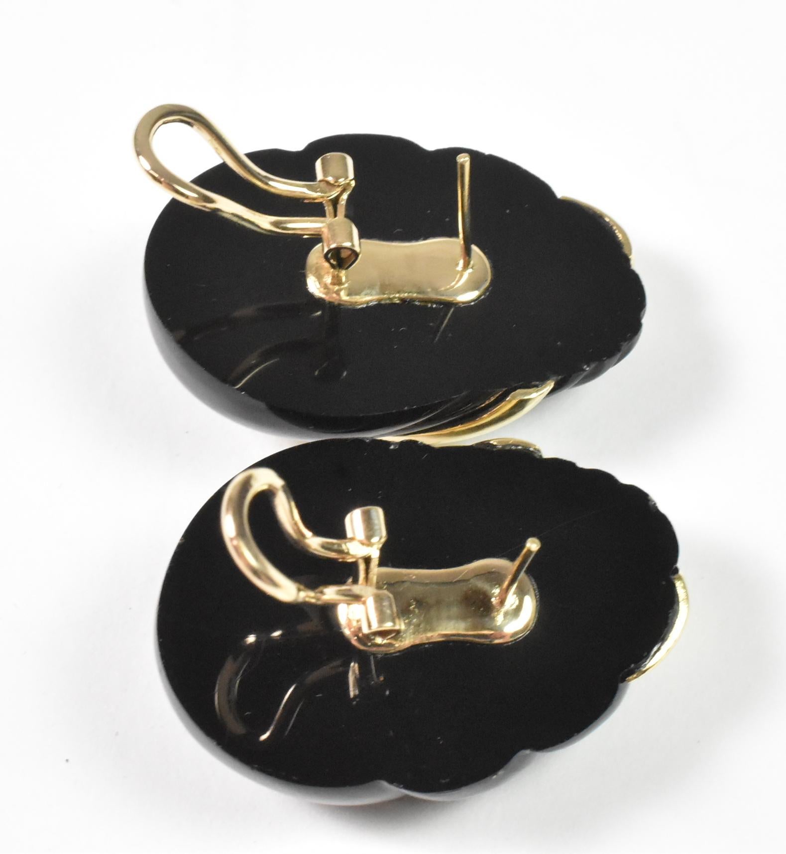 Black onyx earrings, 14K yellow gold, Omega French Clips. Pierced. Vintage oversized statement earrings. Art deco style, carved black onyx in a soothing wave like pattern accented with 14K gold. Omega French clip backs for extra security. 1 3/8