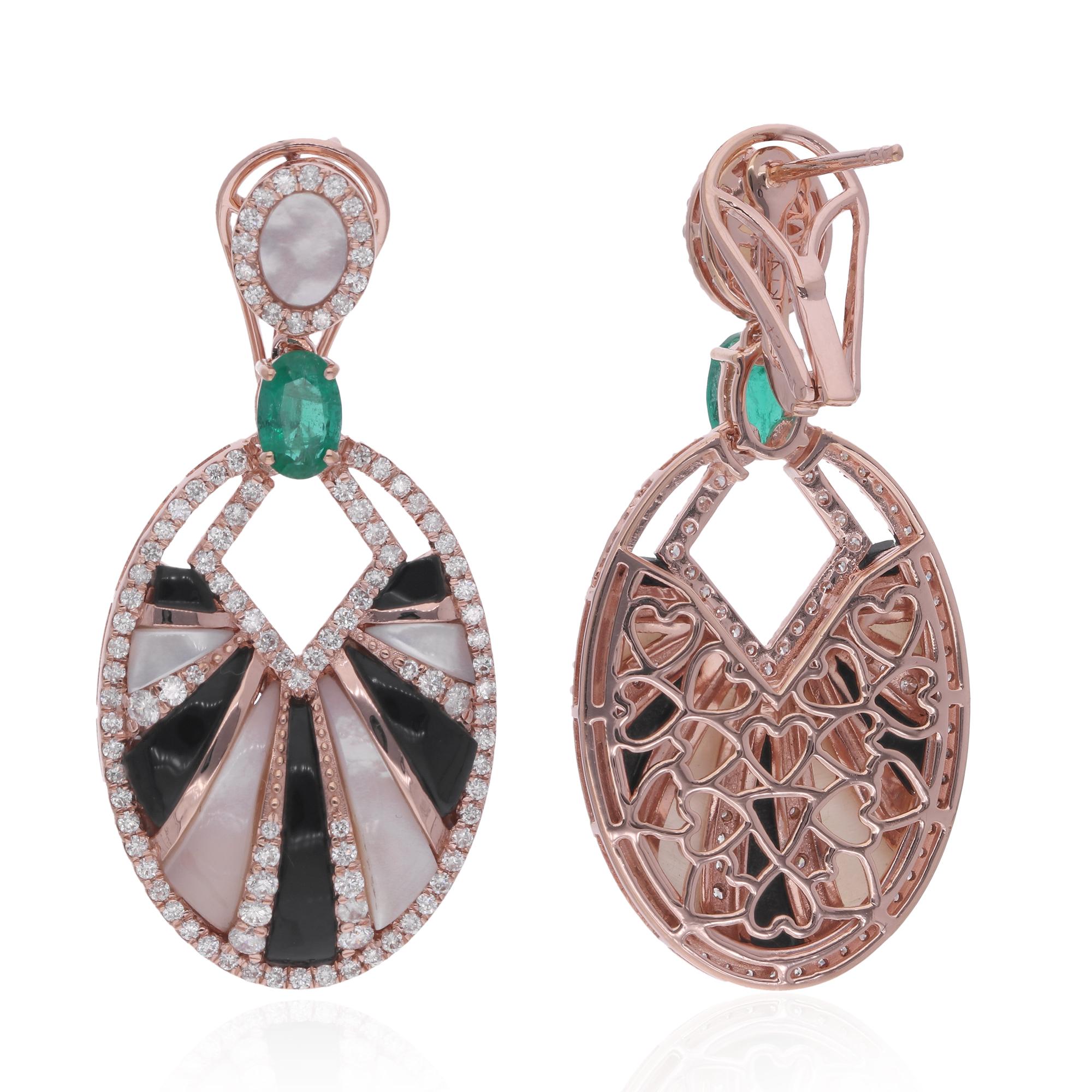 Introducing a mesmerizing blend of elegance and sophistication: the Black Onyx Emerald MOP Gemstone Dangle Earrings adorned with Diamonds, meticulously crafted in luxurious 18 Karat White Gold. These exquisite earrings are a true testament to