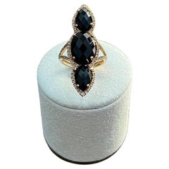 Anello aureolato in oro 14K con diamanti sfaccettati in onice nero