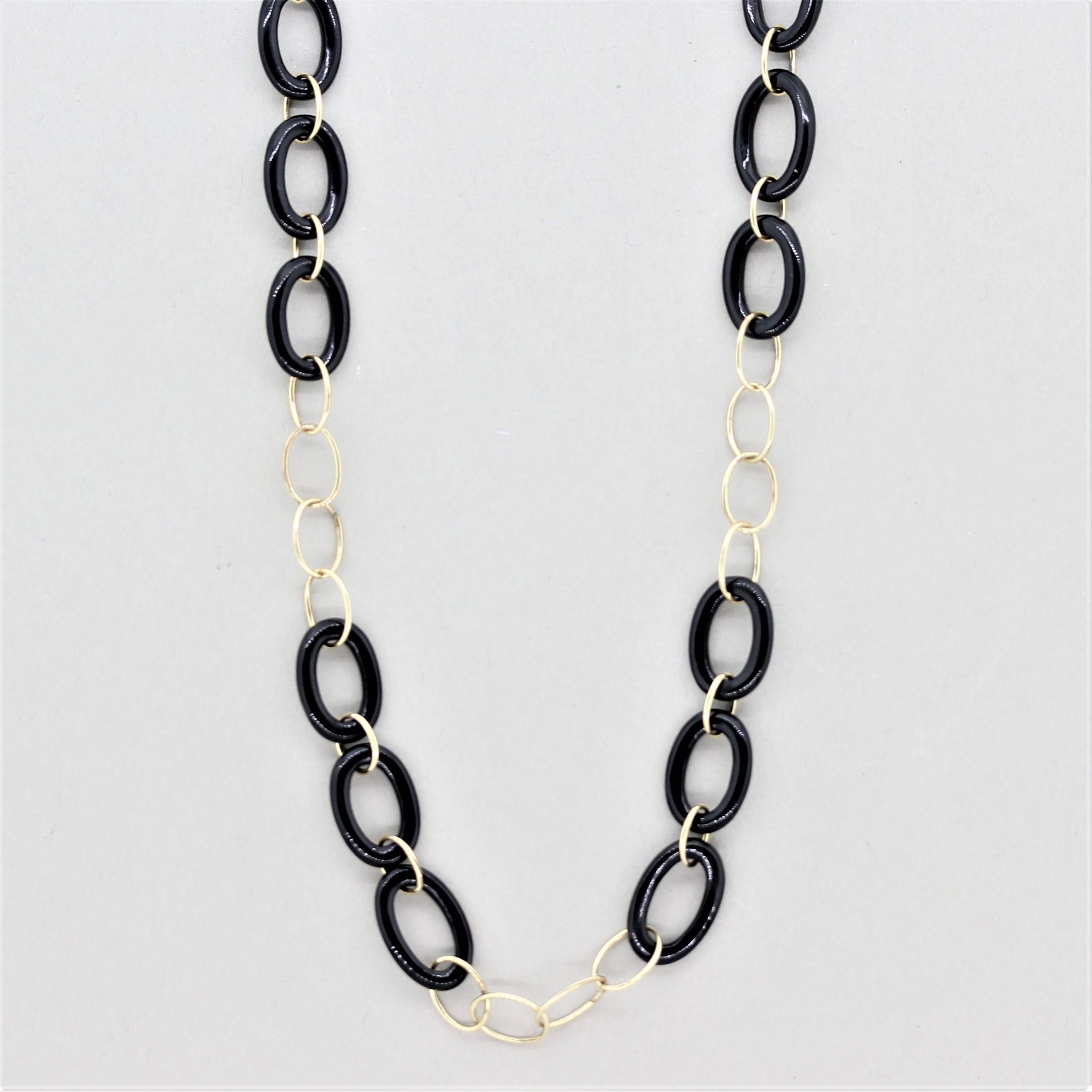 A simple yet chic necklace that can be worn daily! It is made of hoops of 14k rose gold and black onyx which link together in a stylish pattern. Made in 14k gold, light and comfortable to be worn casually every day.

Length: 18 inches