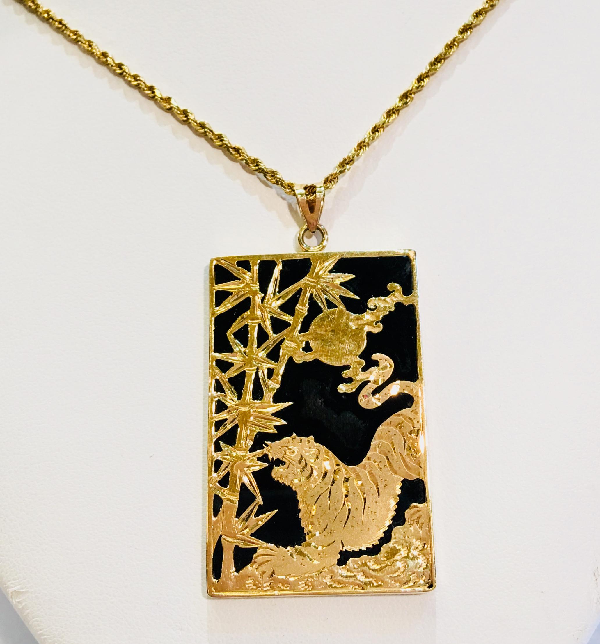 asian gold pendant