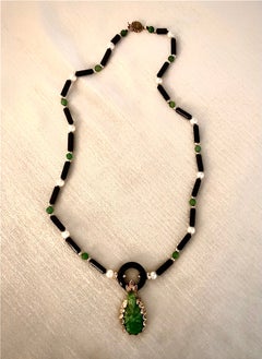 Collana in onice nero, giada verde e oro 14 carati