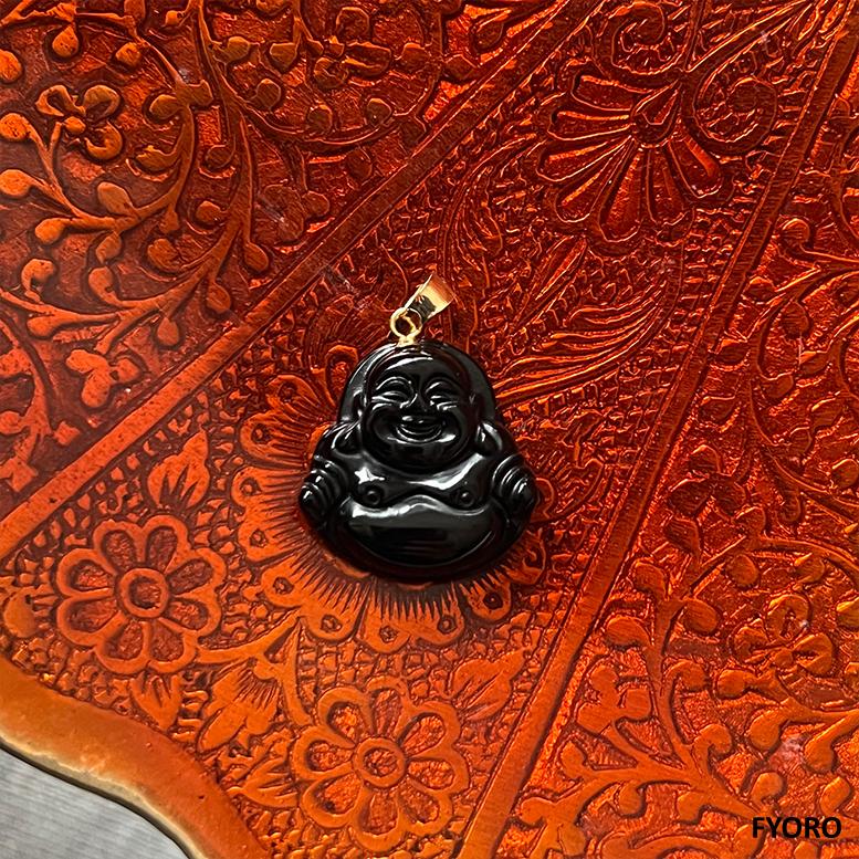 The 'Cha'an Onyx Laughing Buddha Pendant' takes inspiration from the traditional laughing Buddha figure that originates from Zhejiang. This iteration portrays Gautama Buddha laughing yet with a peaceful demeanor.

Made out of Black Onyx, with solid
