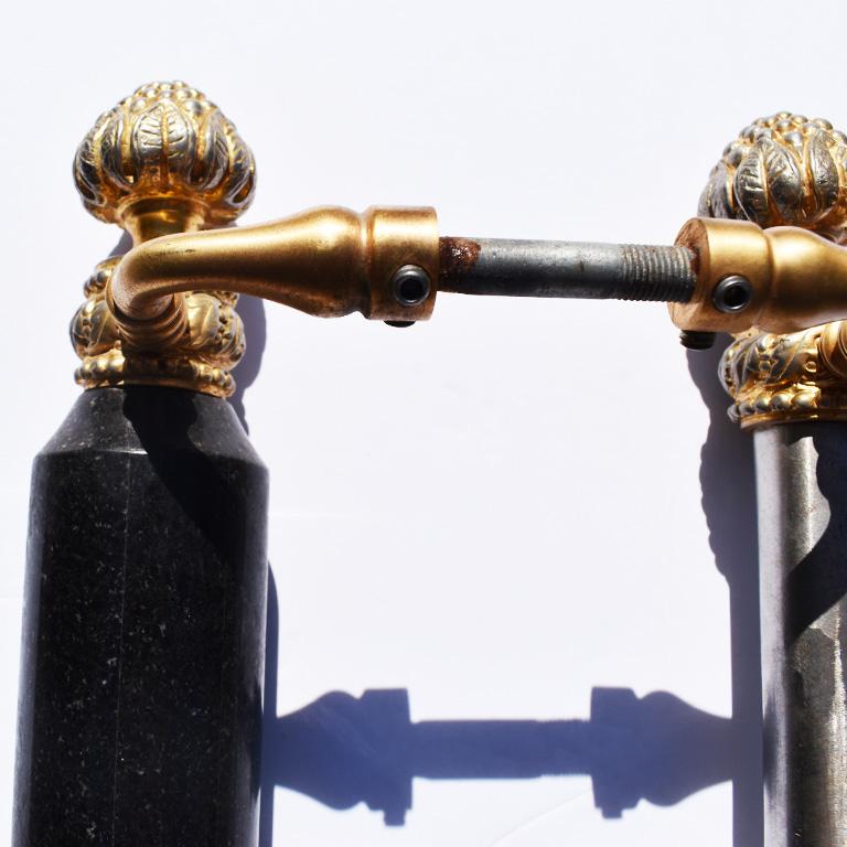 Oversize black onyx shower or door bar pulls, one set by Sherle Wagner. This beautiful set features two large heavy black stone center bars, connected by gold-plated hardware. At both the top and bottom of each pull, show a grouping of grapes as