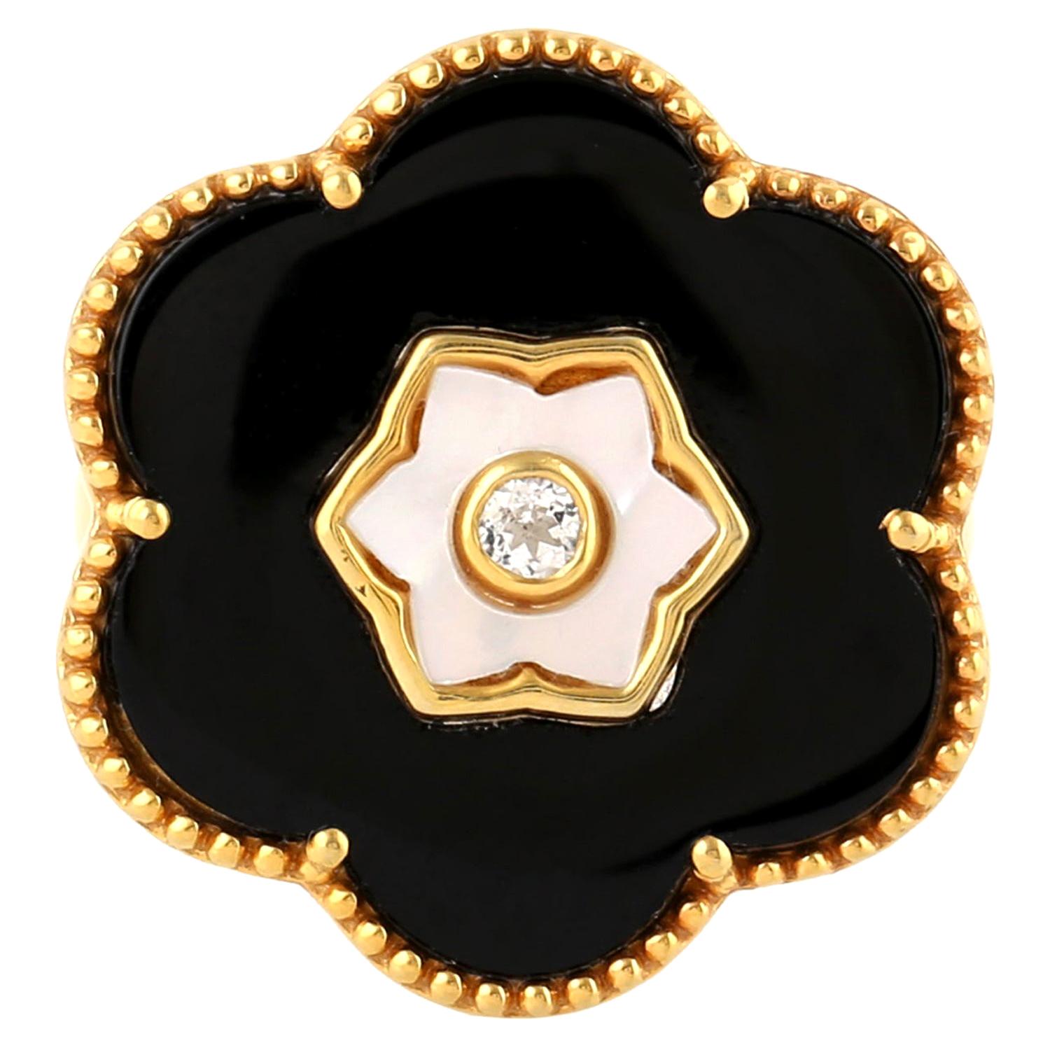 For Sale:  Black Onyx Topaz Mother of Pearl Flower Ring