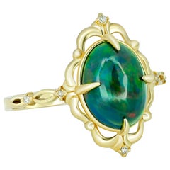 Black opal 14k gold ring.