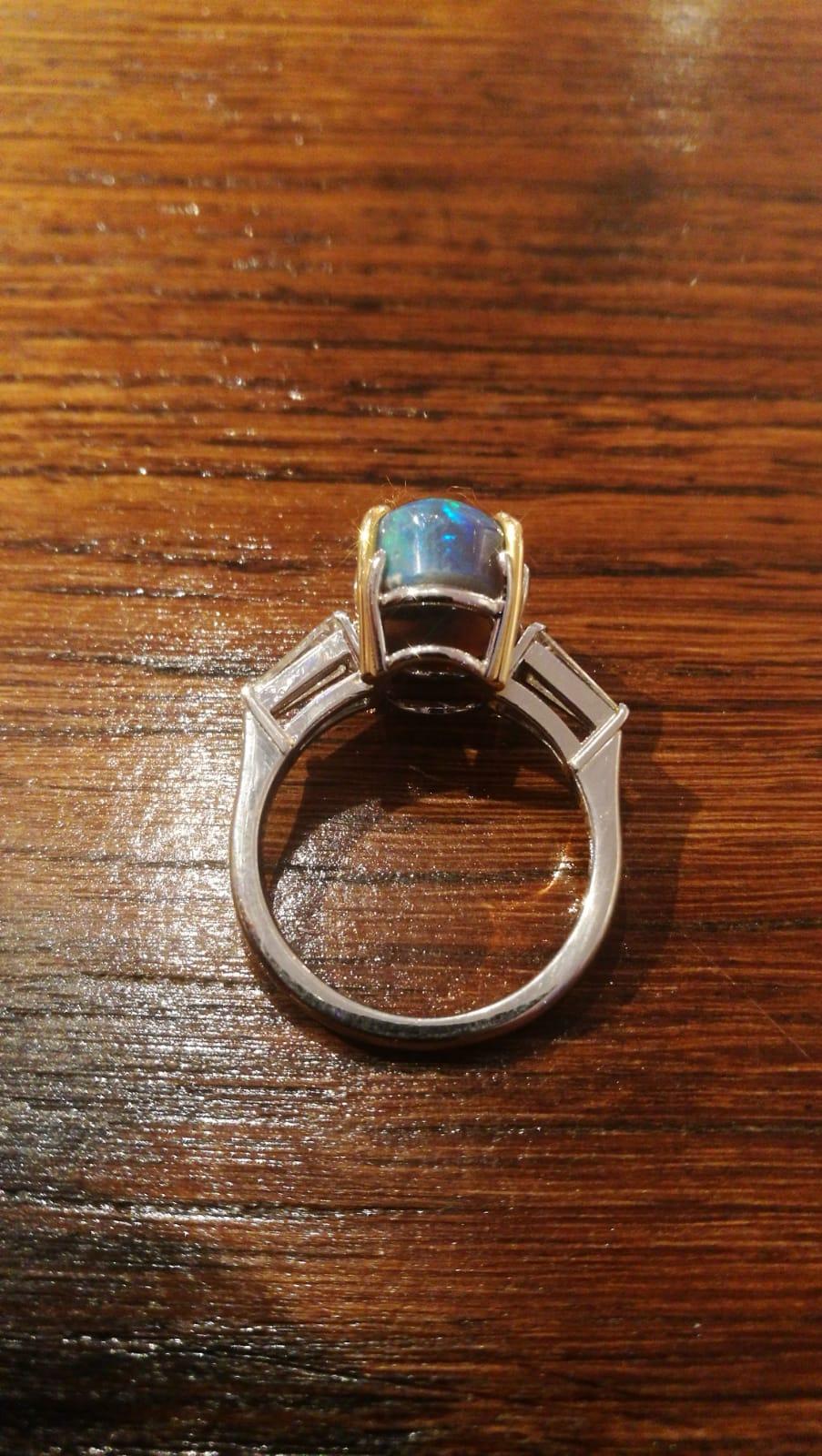 Black opal 18kt whitegold ring with diamonds