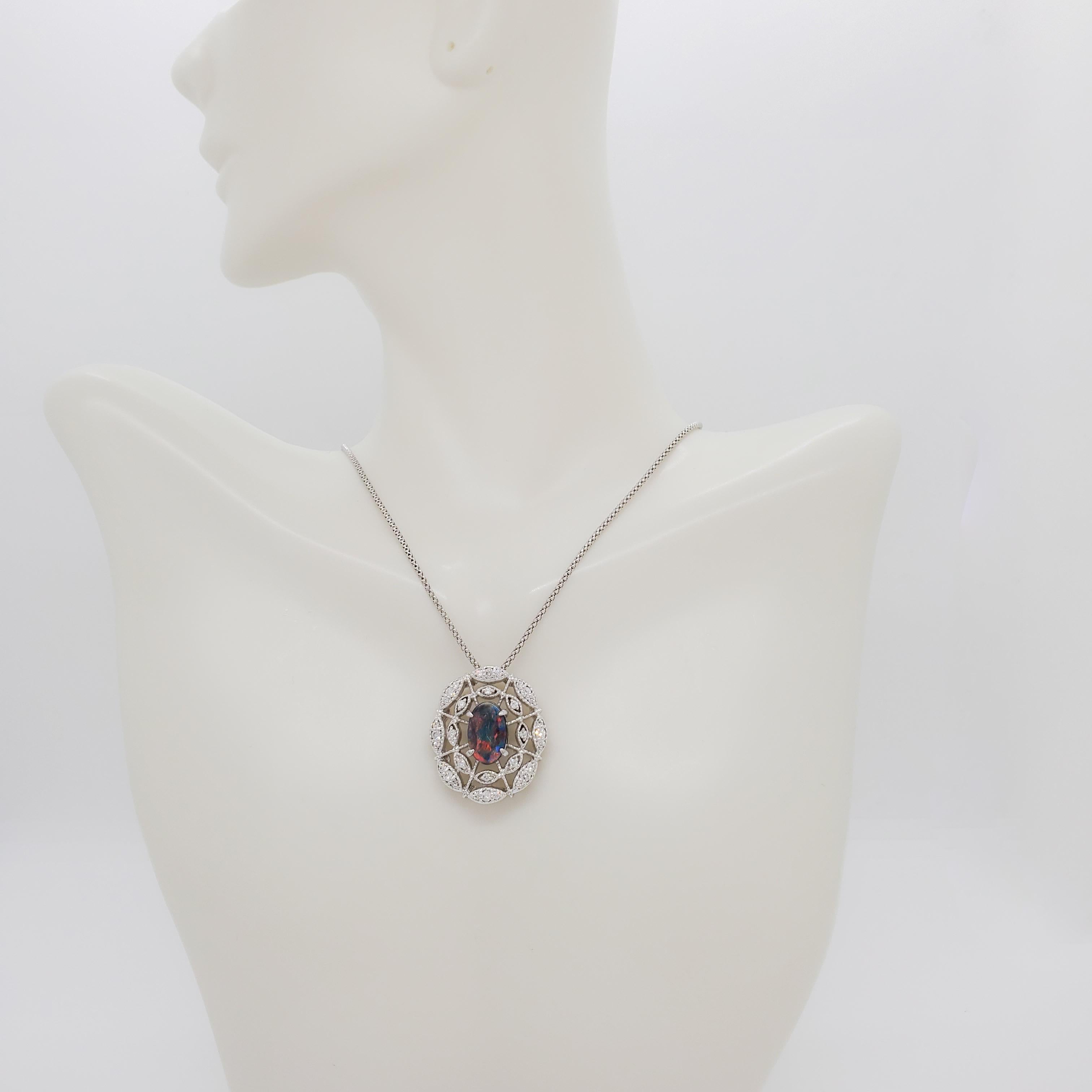 Oval Cut Black Opal and Diamond Pendant Necklace in 18k White Gold For Sale