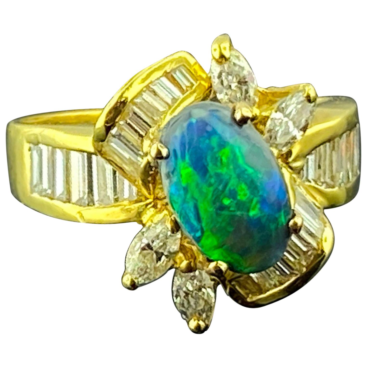 Black Opal and Diamond Ring in 18 Karat Yellow Gold