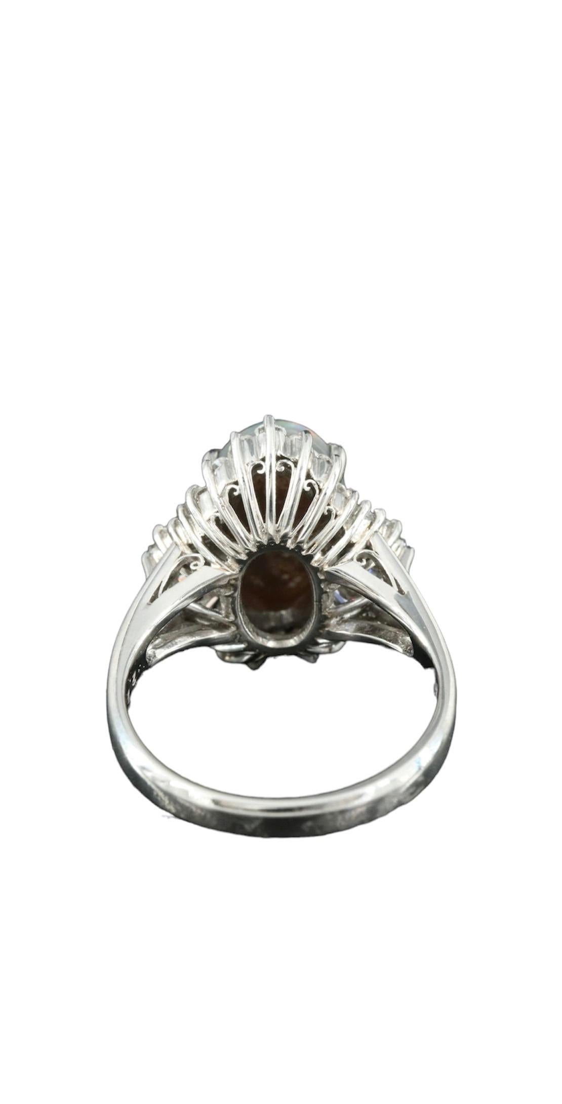 Auktion - Ring aus Platin mit schwarzem Opal und Diamant (Ovalschliff) im Angebot