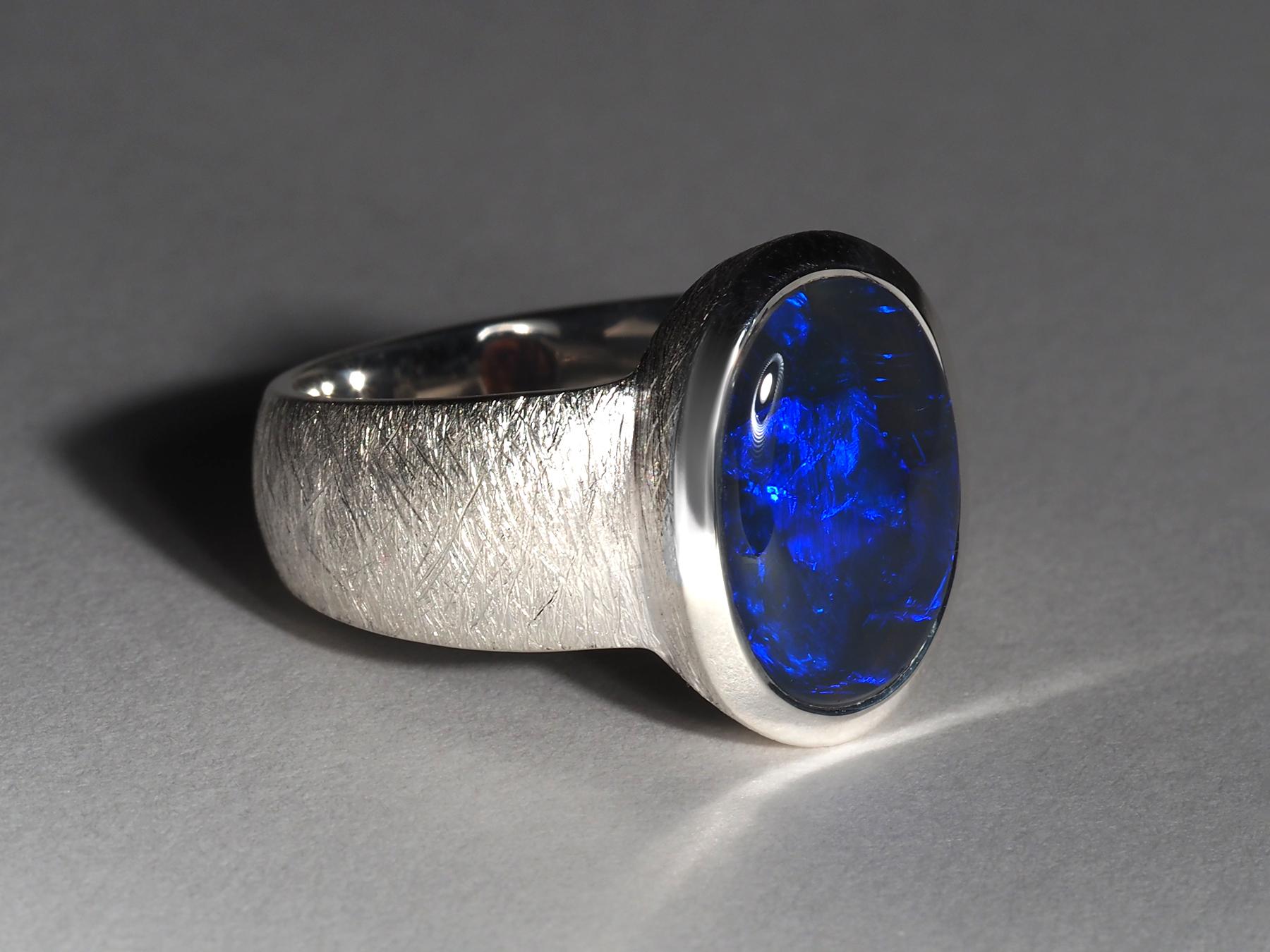 Silver ring with natural vivid Black Inky Lightning Opal
Opal origin - Australia
weight of the Opal - 5.75 carat, body tone - 5
gemstone measurements about 10 х 14 mm
ring weight - 9 grams
ring size - 7.9 - 8 US, diameter 18.25 mm, N 17,