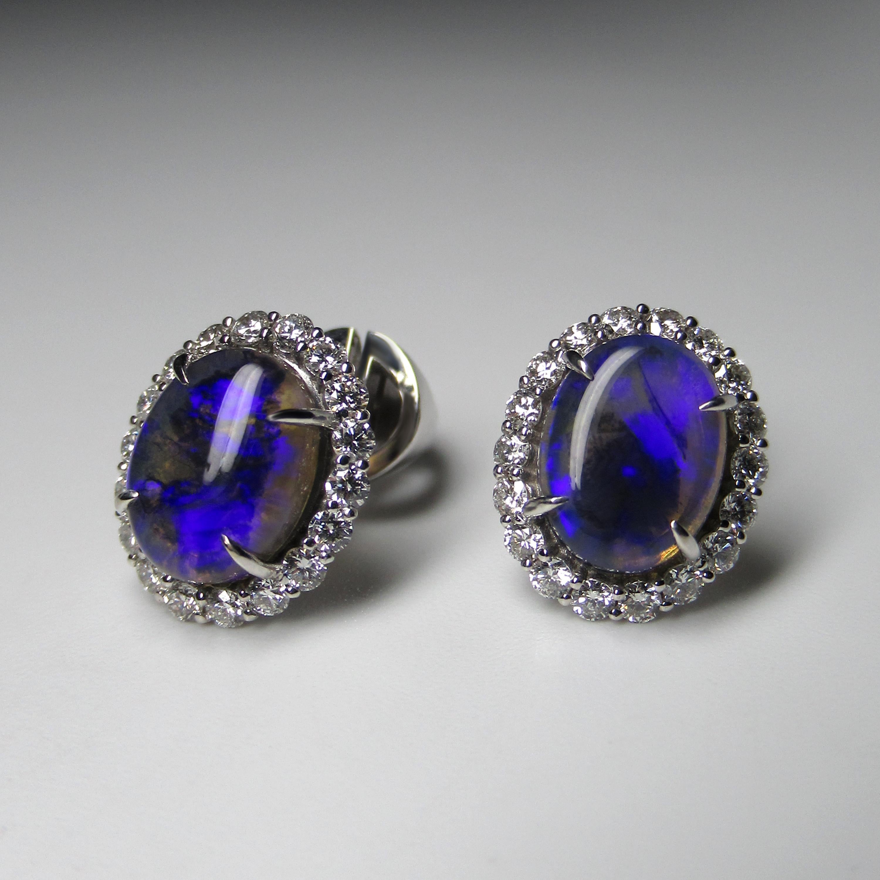 Black Opal 14K white gold earrings 
opal origin - Australia
opal weight - 2.43 carats
earring weight - 4 grams
stone measurements - 0.12 x 0.24  x 0.31 in / 3 x 6 x 8 mm


We ship our jewelry worldwide – for our customers it is free of charge and