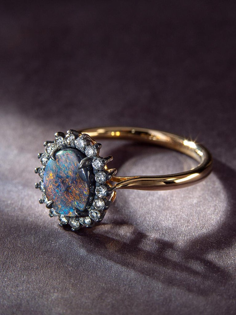 18K yellow gold patinated silver ring with natural Black Opal and Diamonds

opal origin - Australia

opal measurements - 0.28 х 0.35 in / 7 х 9 mm

stone weight - 0.88 carats

ring weight - 2.94 grams

ring size - 7.25 US / 17.5 RU

Cupid collection