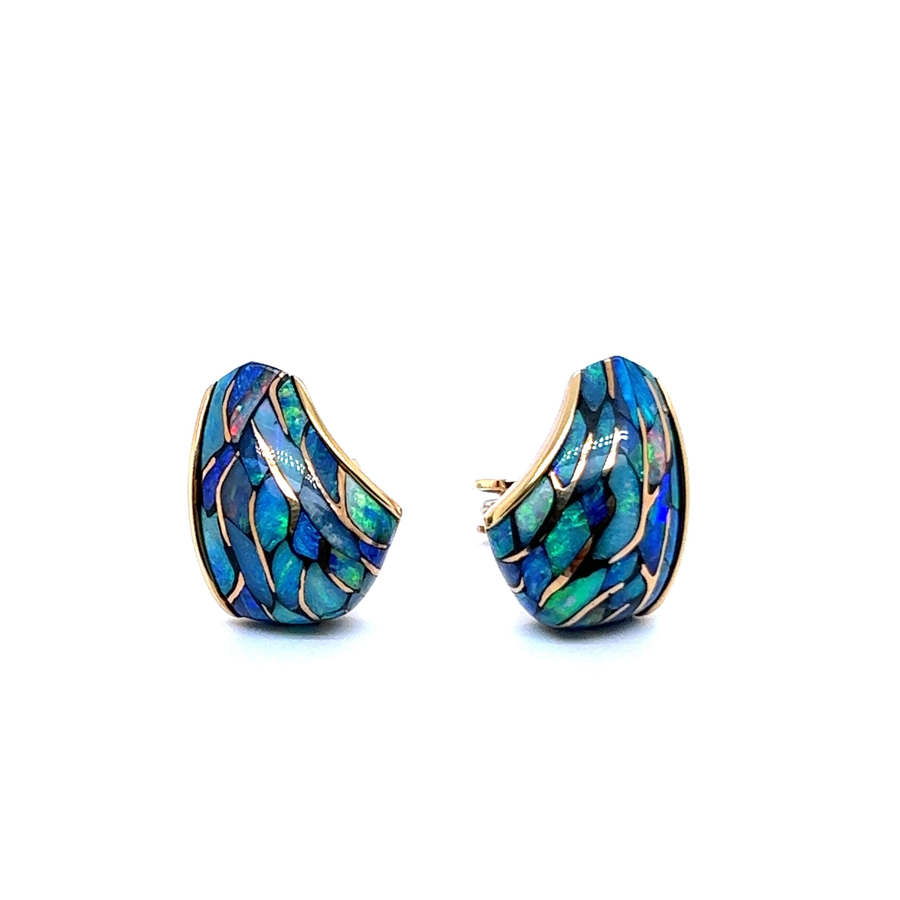 A riot of colour and flare - fiery black opal earrings in exquisite rose gold. 

Black opal is a precious gemstone with a long history rooted in Australia. Indigenous Australians have revered opals for centuries, considering them sacred and imbued