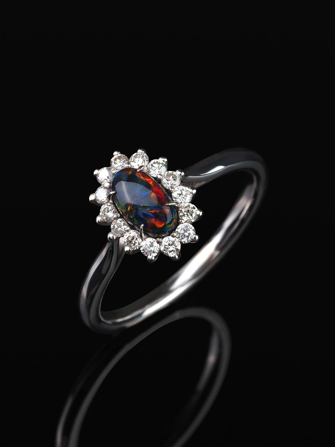 14K gold ring with Black opal and diamonds 
opal origin - Australia 
opal measurements - 0.079 х 0.16 х 0.28 in / 2 х 4 х 7 mm
opal weight - 0.71 carats
ring size - 7 US
ring weight - 2.94 grams

Cupid collection


We ship our jewelry worldwide –