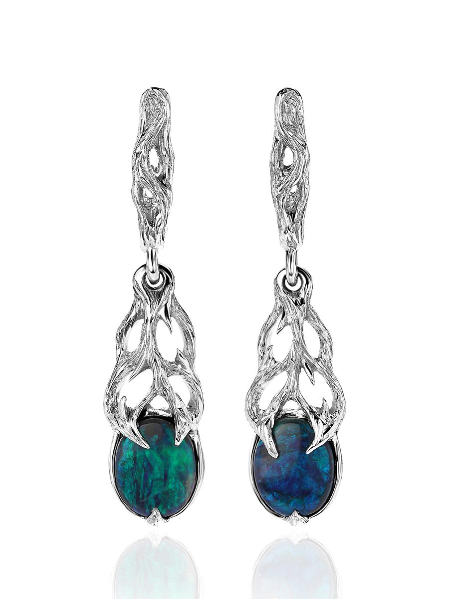 18K white gold earrings with natural Black Opal
opal origin - Australia
opal measurements - 0.31 x 0.39 in / 8 х 10 mm
stones weight - 2.15 carats
earrings height - 1.81 in / 46 mm
earrings weight - 11.5 grams

Roots collection


We ship our jewelry