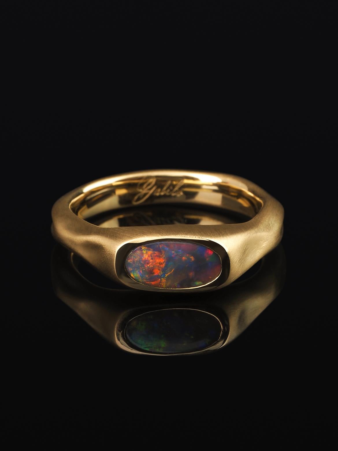 18K yellow gold ring with natural Black Opal
Opal origin - Australia
weight of the opal - 1.5 carat
opal measurements - 0.2 х 0.34 in / 5 х 9 mm
weight of the ring - 9 grams
ring size - 9 US
