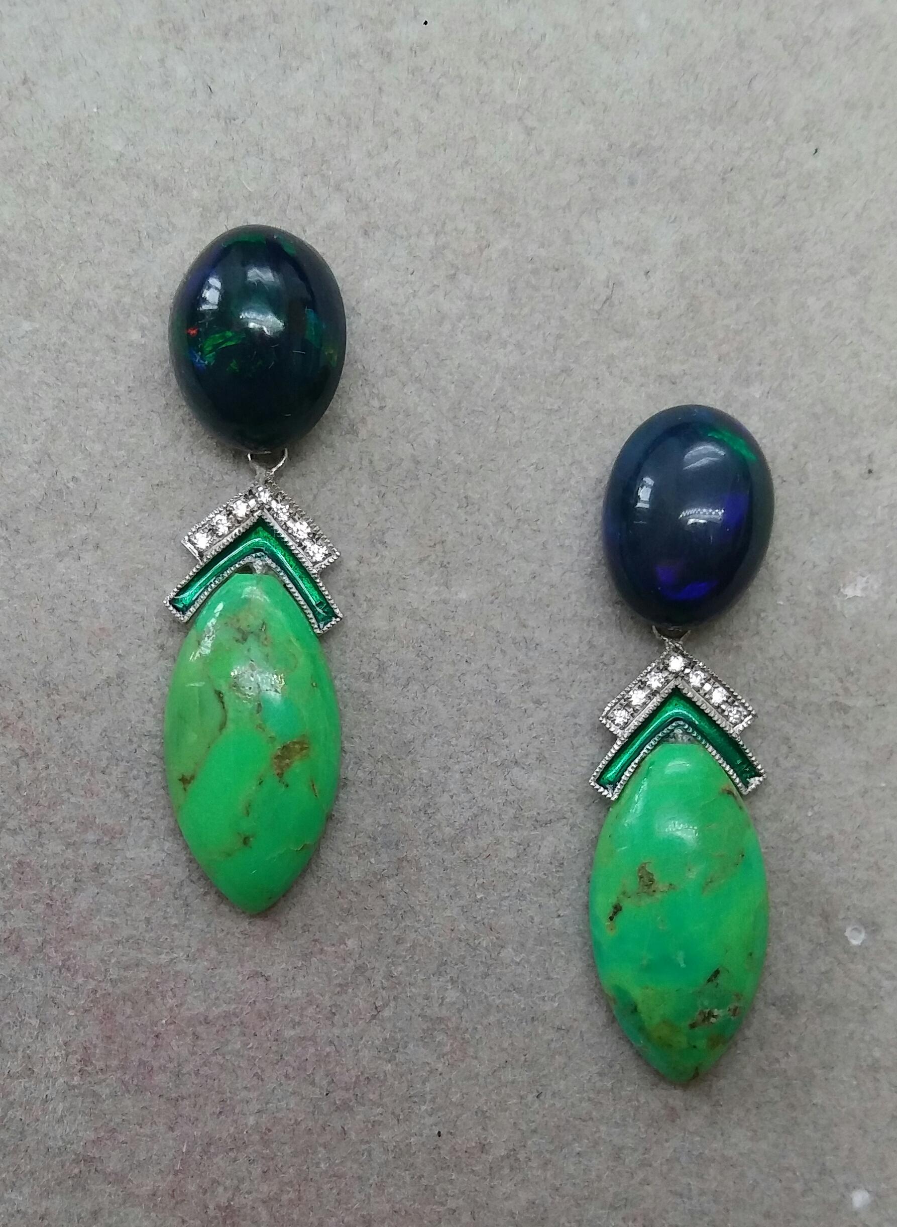 In these unique art deco style earrings we have the upper  parts composed by 2 Black Opal oval cabochon 10mm x 12mm, in the central parts we have a pair of 14 kt gold elements ,14 full cut diamonds and green enamel,  the bottom parts there are 2