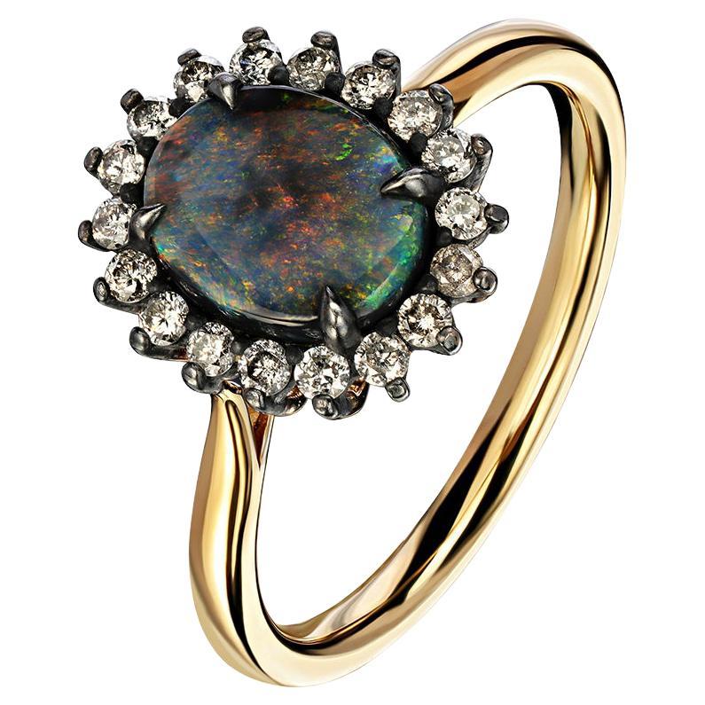 18K yellow gold and patinated silver ring with natural Black Opal and Diamonds
opal origin - Australia
opal measurements - 0.28 х 0.35 in / 7 х 9 mm
stone weight - 0.88 carats
ring weight - 2.94 grams
ring size - 7.25 US (this ring may be resized,