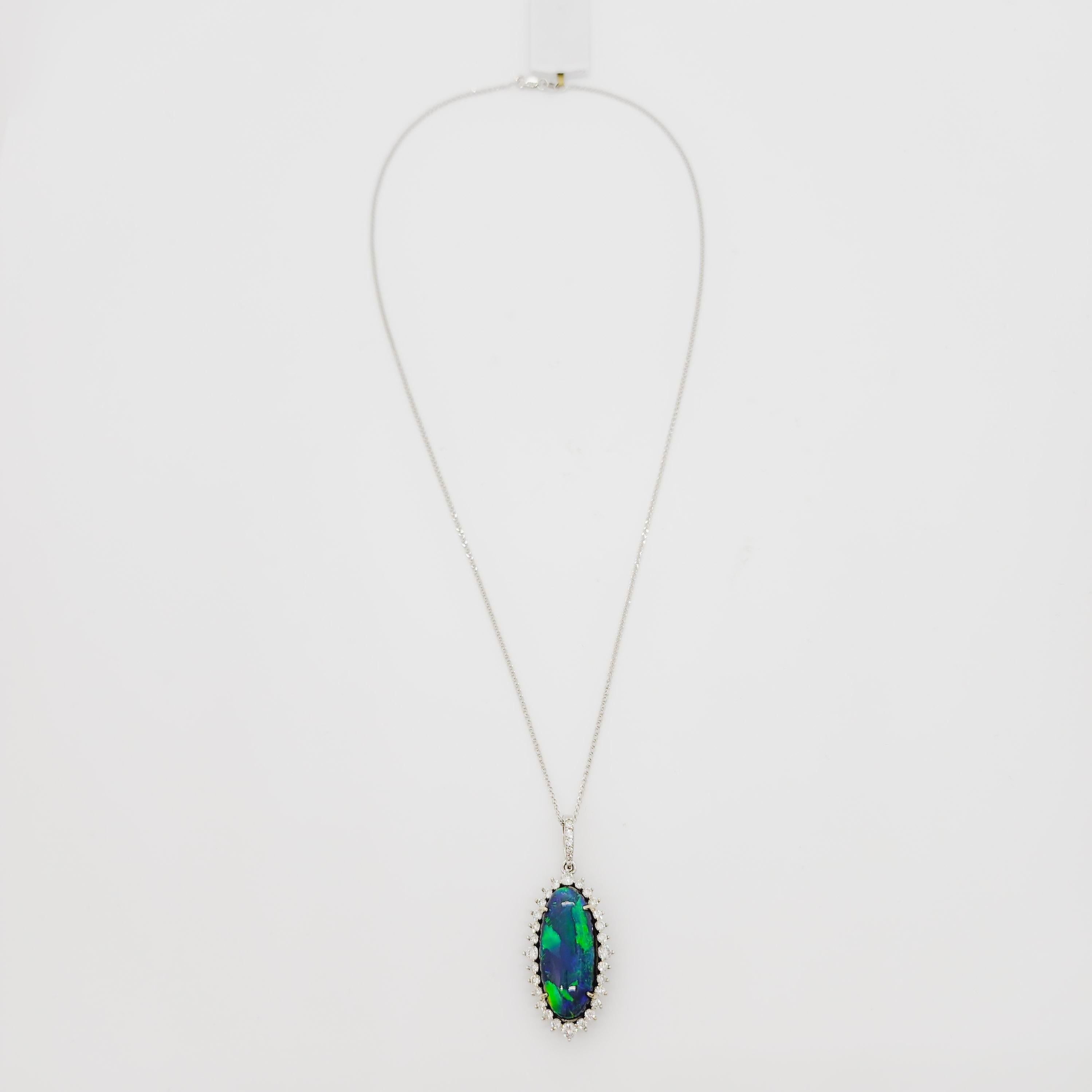 Oval Cut Black Opal Oval and Diamond Pendant Necklace in 18k White Gold For Sale