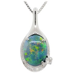 Black Opal Oval and White Diamond Pendant Necklace in 18 Karat White Gold