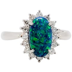 Black Opal Oval Cabochon and White Diamond Cocktail Ring in Platinum