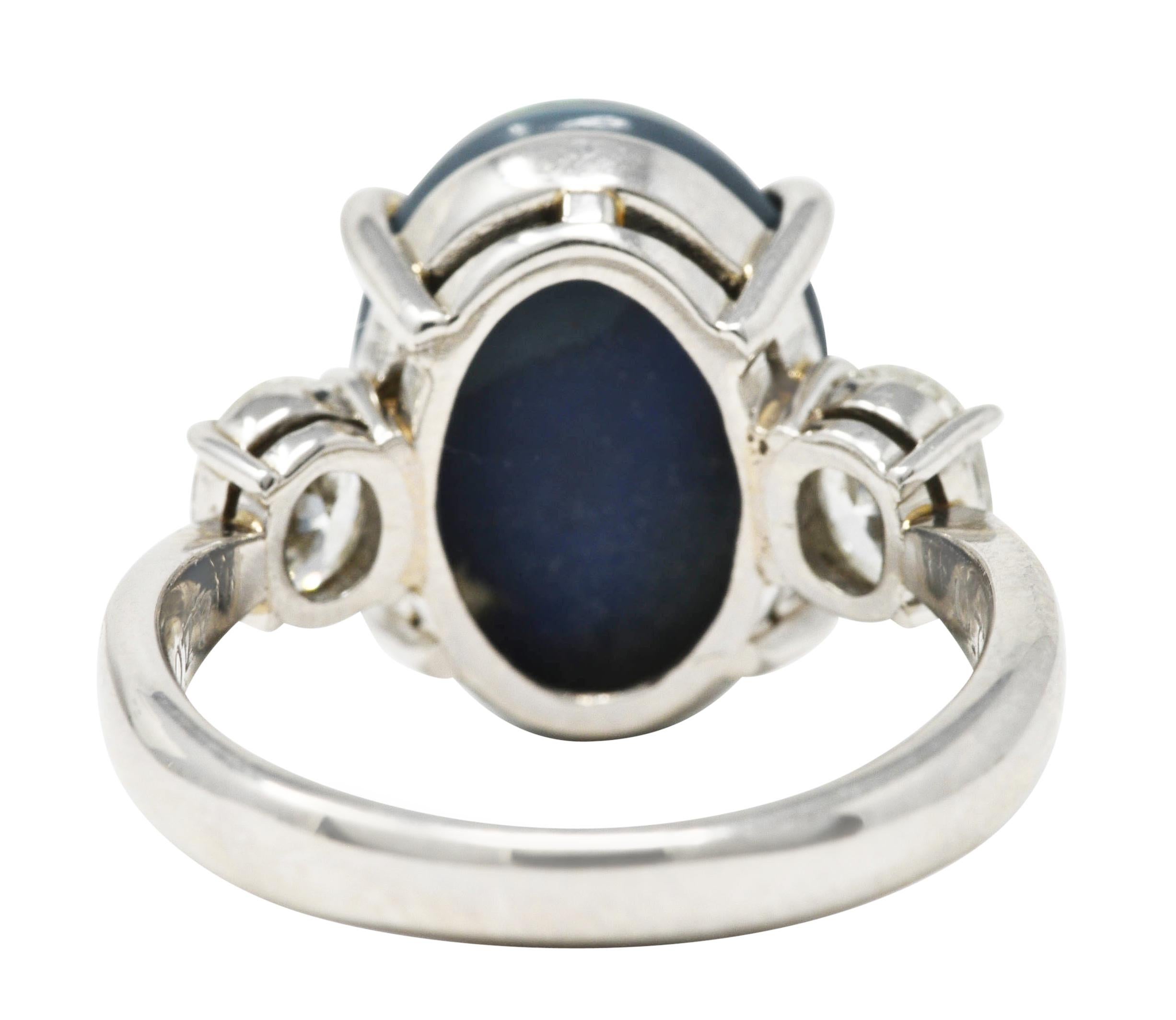 Contemporary Black Opal Oval Cut Diamond Platinum Three Stone Gemstone Ring For Sale