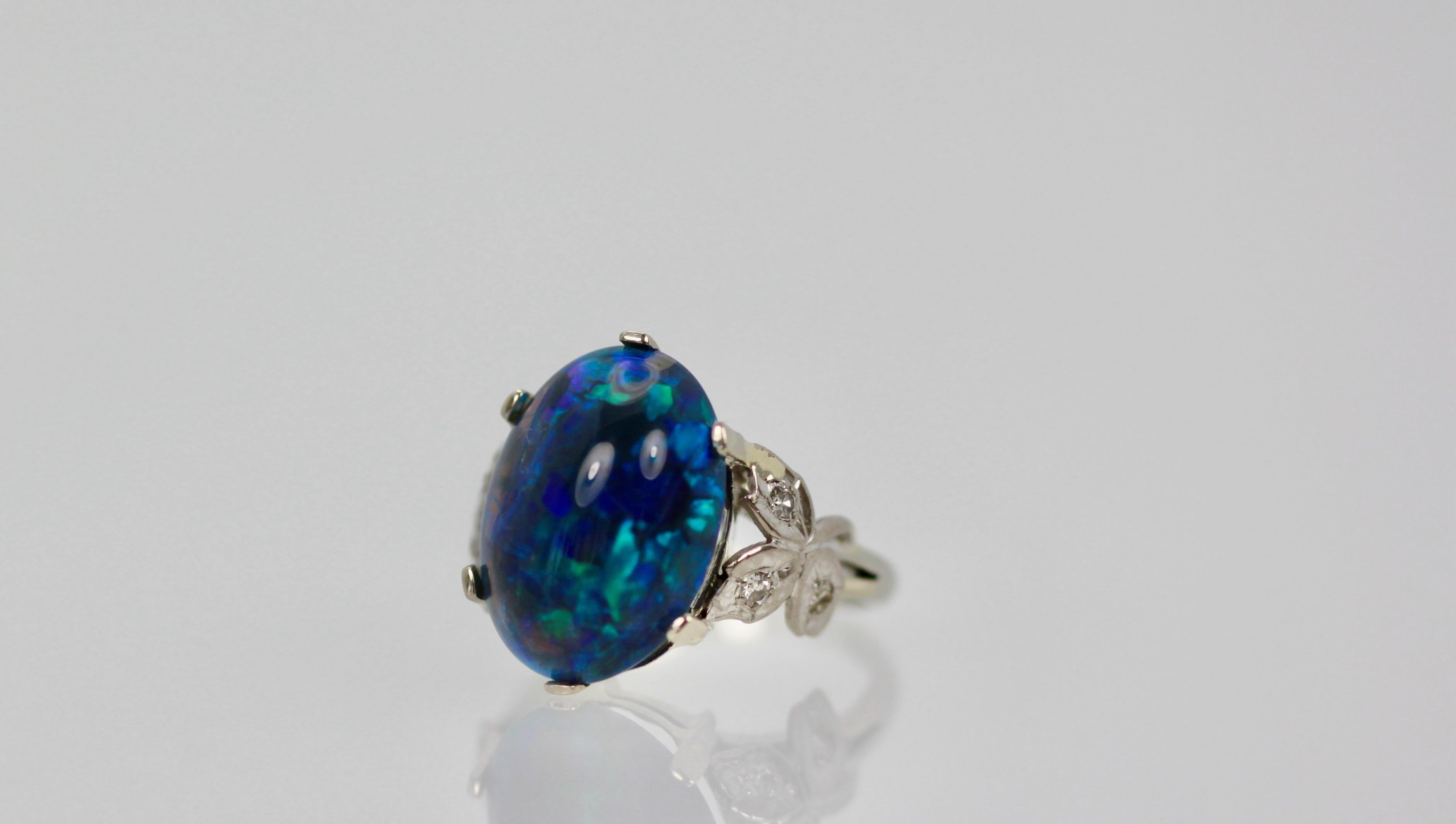 Oval Cut Black Opal Platinum Ring