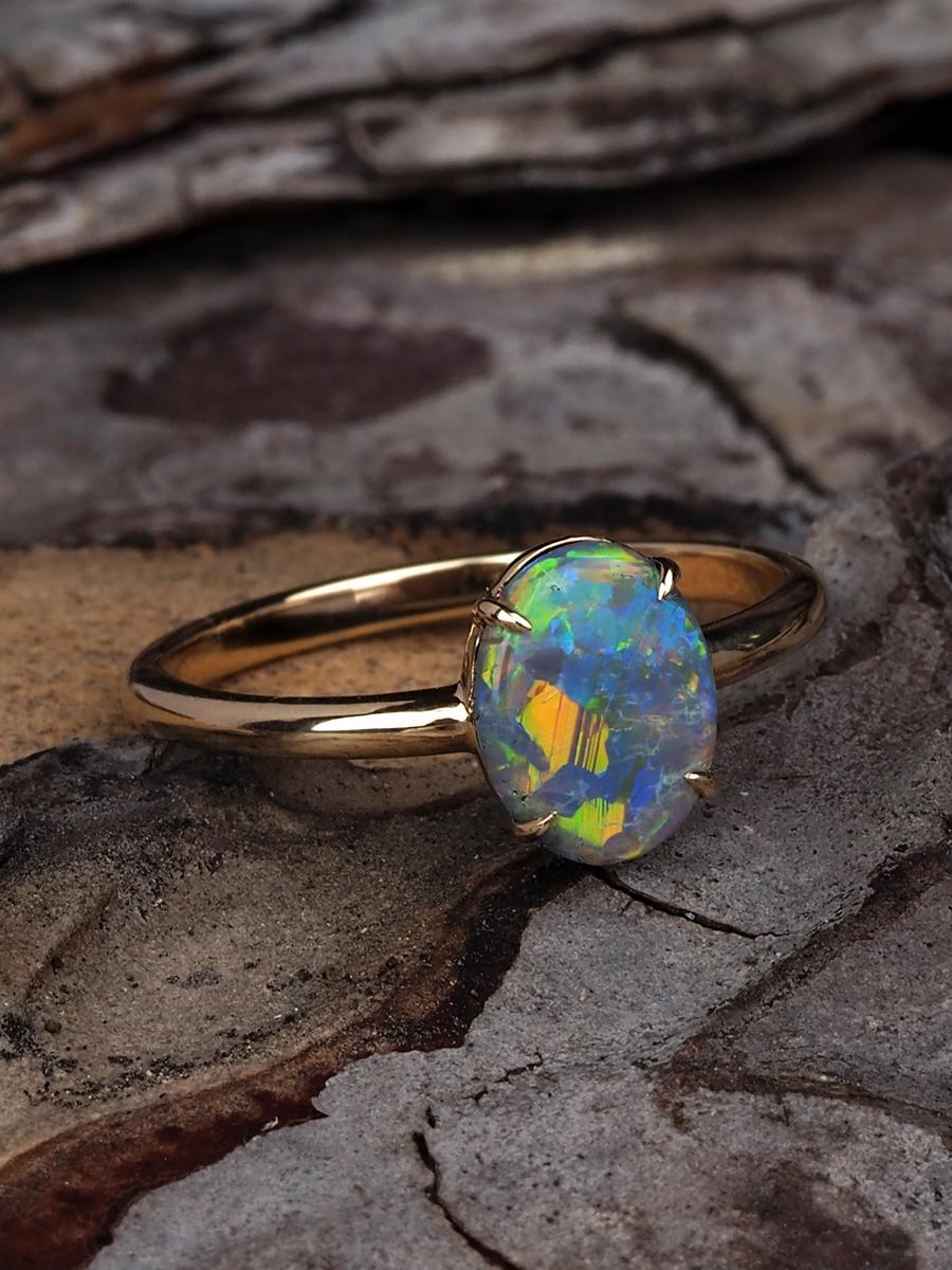 18K yellow gold ring with natural bright Black Opal

opal origin - Australia

opal weight - 1.5 carats

stone measurements - 0.08 х 0.28 х 0.35 in / 2 х 7 х 9 mm

ring weight - 1.78 grams

ring size - 7.25 US