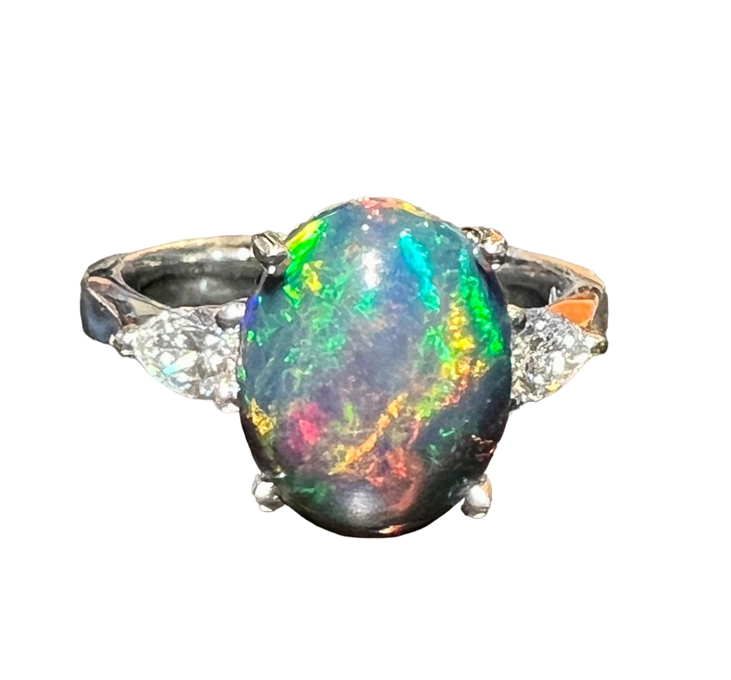 Black Opal ring surrounded by 2 pears 18 carat white gold diamond For Sale 4