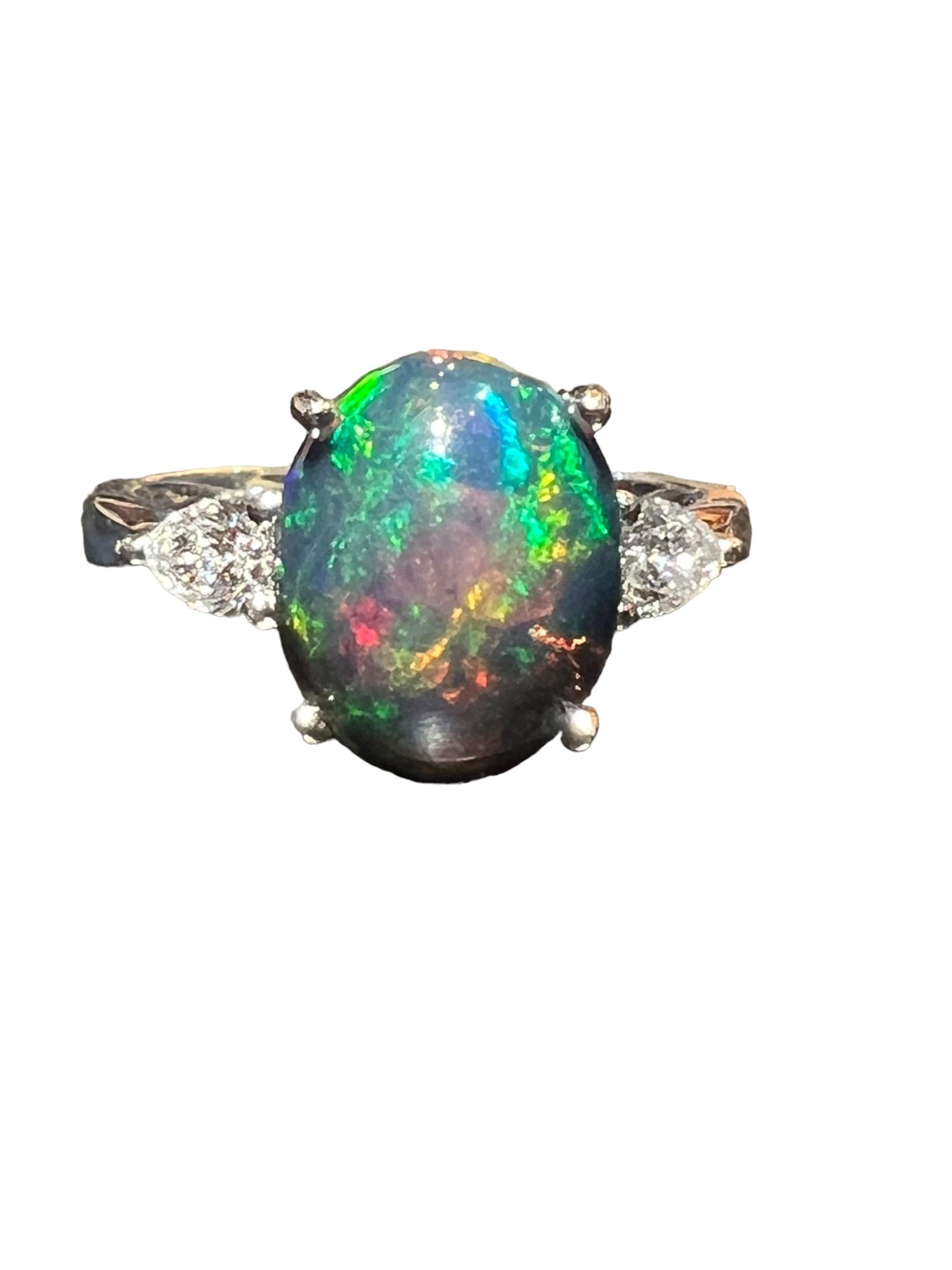 Black Opal ring surrounded by 2 pears 18 carat white gold diamond For Sale 5