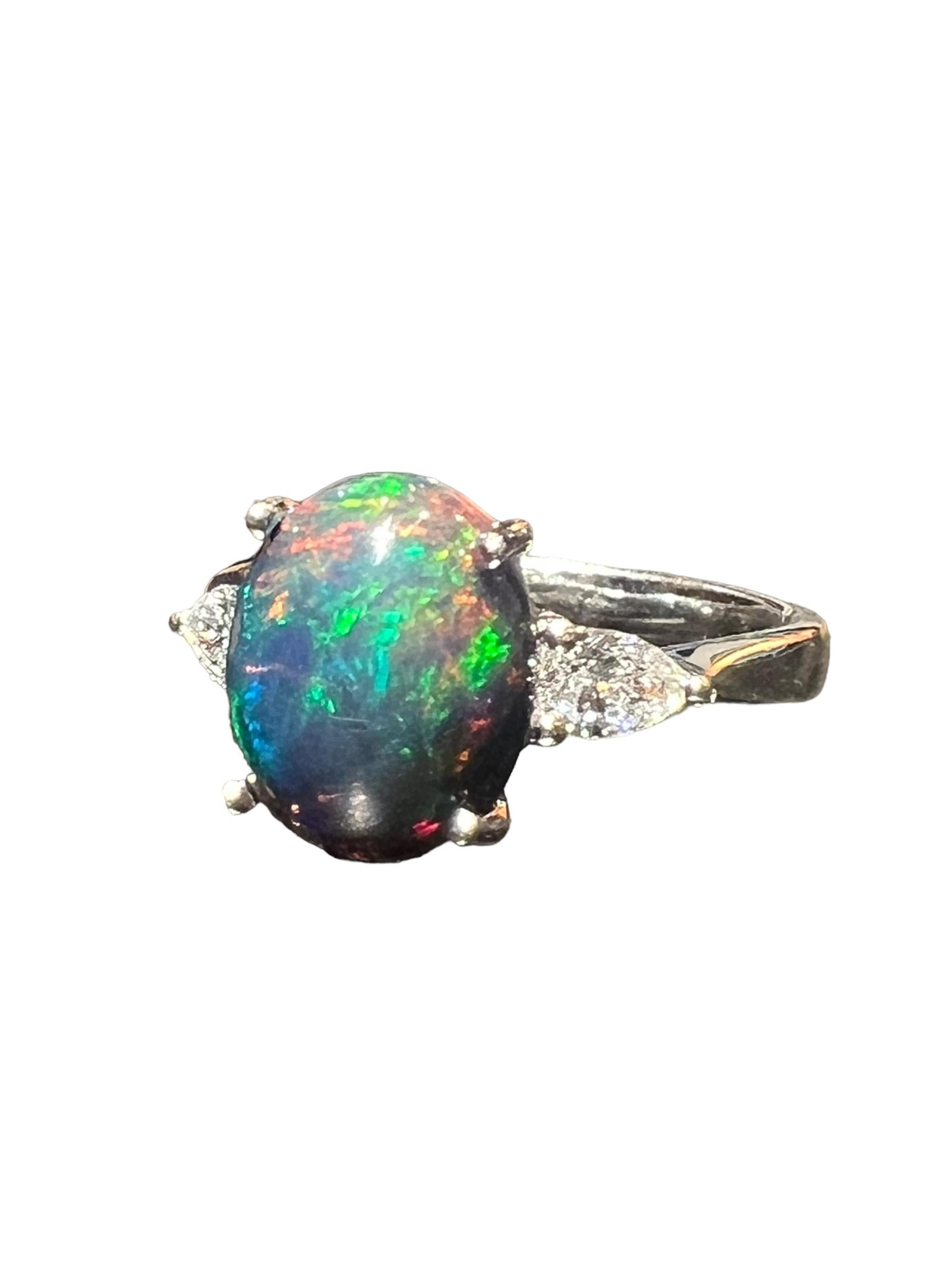 Black Opal ring surrounded by 2 pears 18 carat white gold diamond For Sale 6
