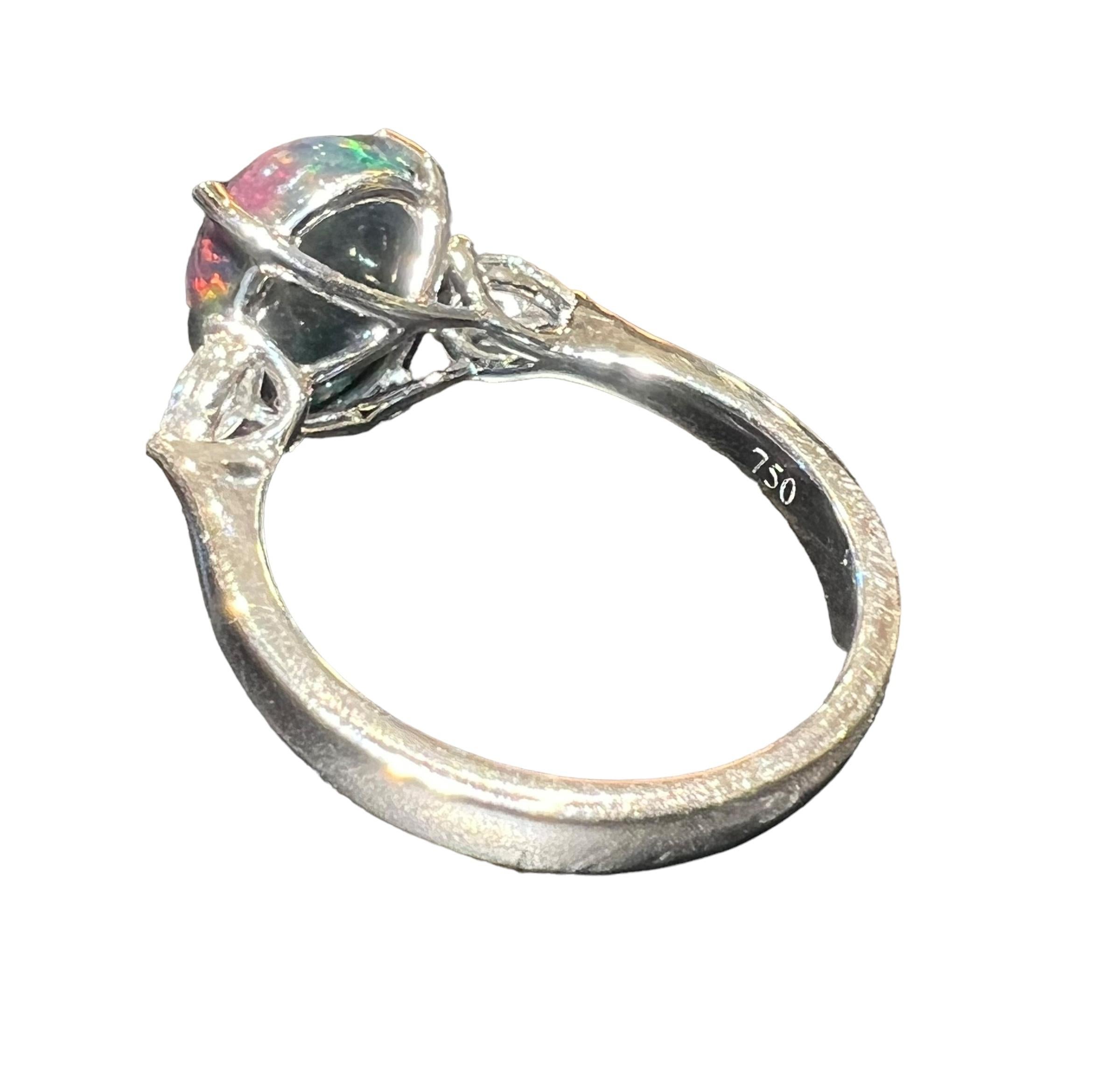Black Opal ring surrounded by 2 pears 18 carat white gold diamond For Sale 8