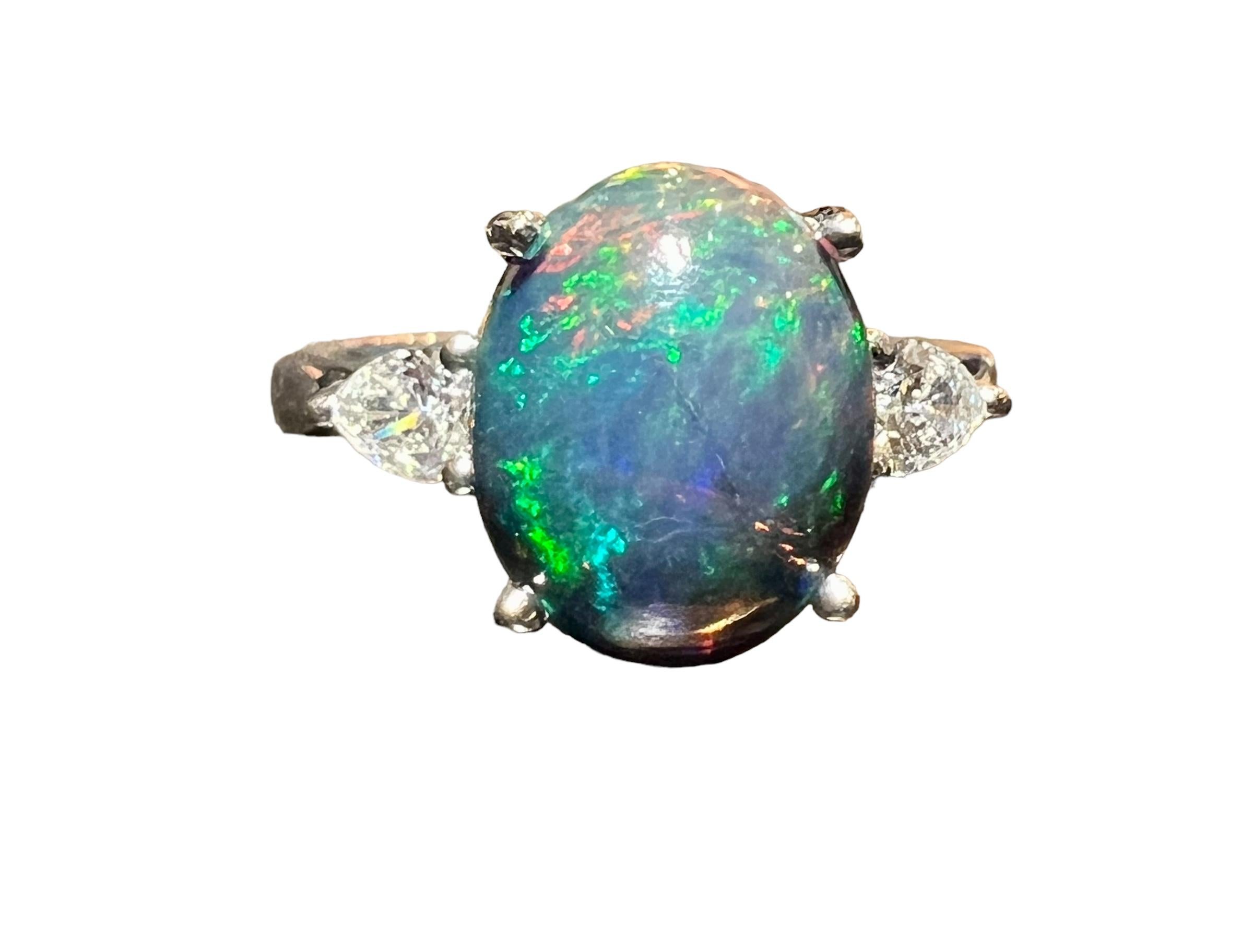 Black Opal ring surrounded by 2 pears 18 carat white gold diamond For Sale 10