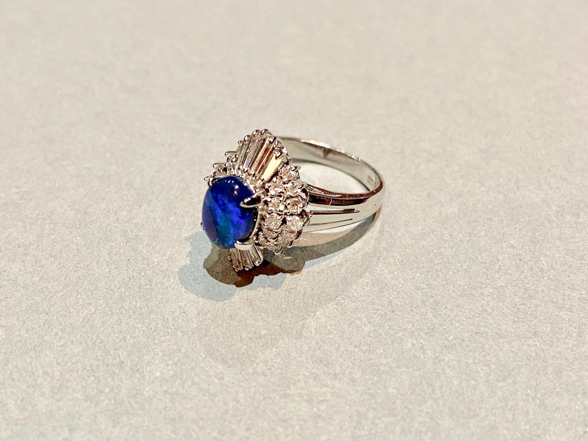 Round Cut Black Opal, Round Brilliant and Tapered Baguette Diamond and Platinum Ring For Sale