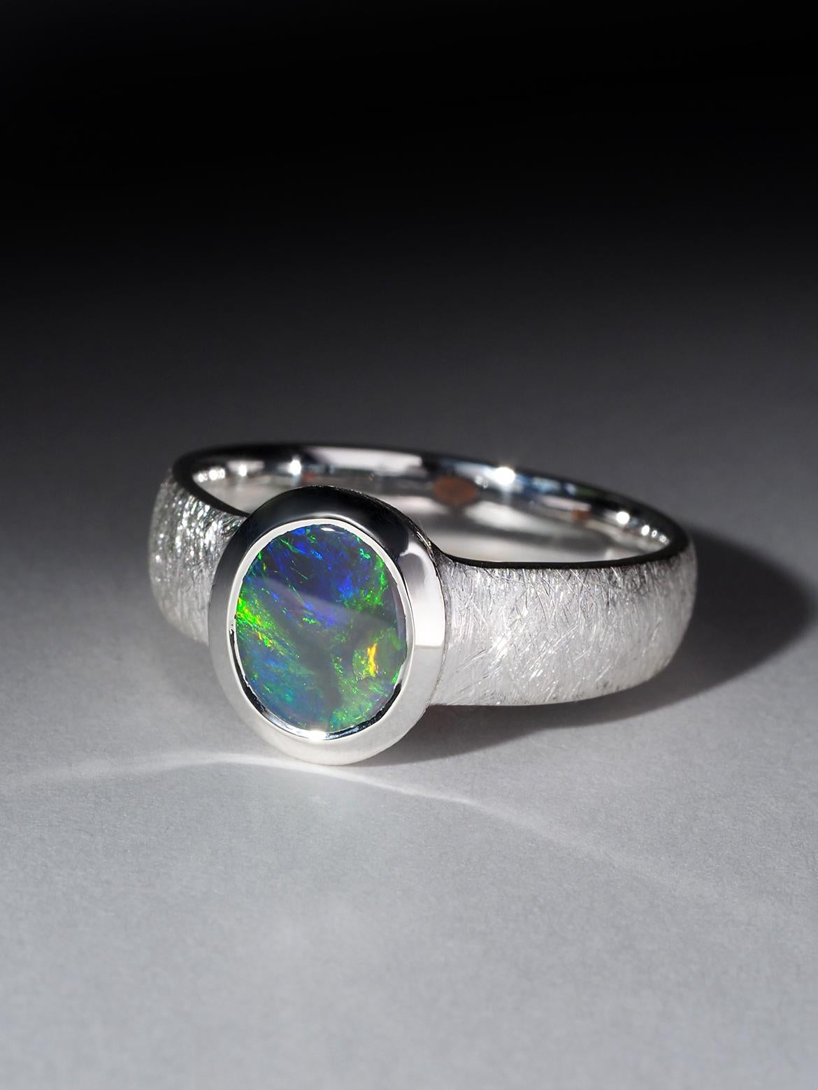 Beautiful Black Opal ring with blue, yellow and green colors of opalescence in silver
size of the ring - 7.5 US / 17 3/4 diameter / N 16 / 56 circumference
ring weight - 4.9 grams
stone measurements - 0.27 х 0.31 in / 7 х 8 mm
Opal origin -